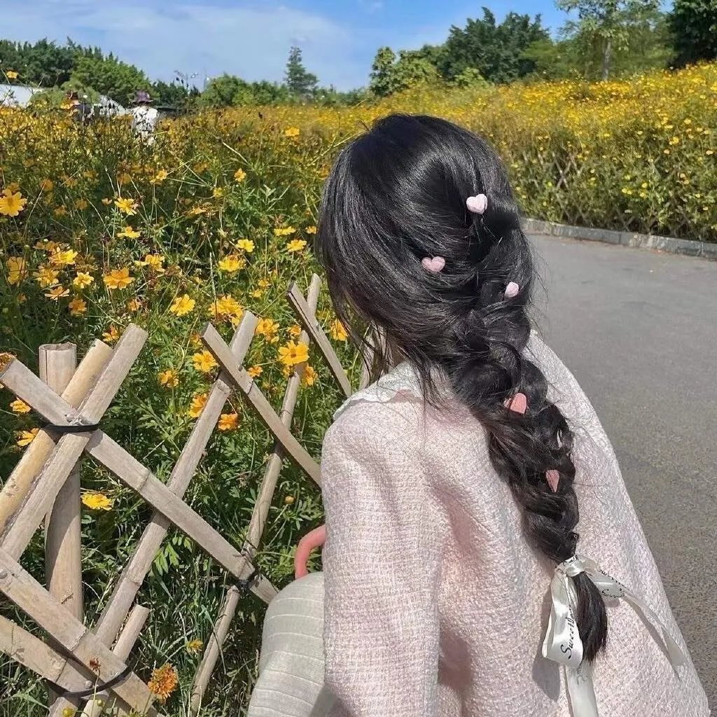 彼女